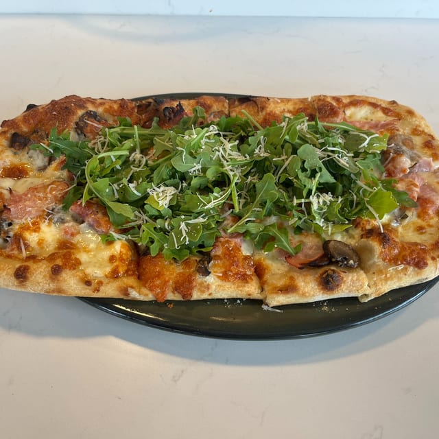 Mushroom & Prosciutto Cotto Bianca Pizza.